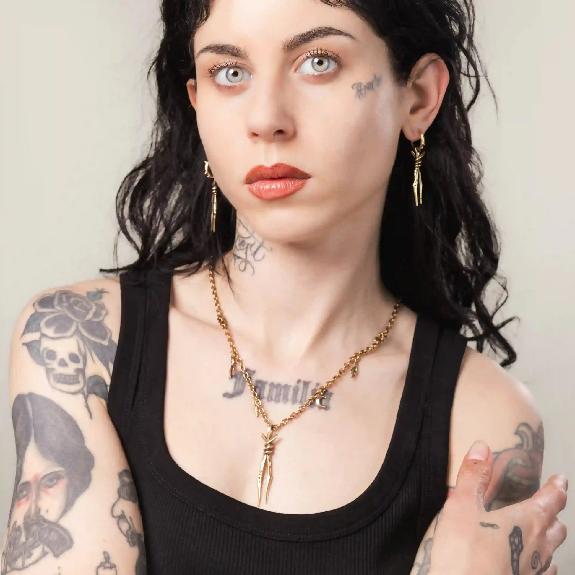 Silver Bound Twin Necklace worn by model with gothic statement jewelry styling