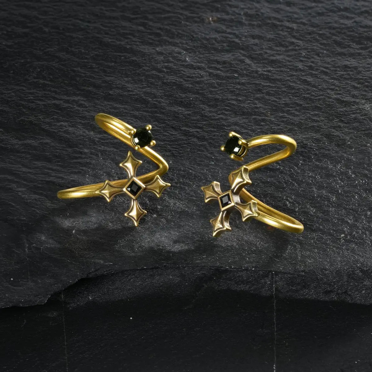 Gold Bound Vestige Ear Cuffs displayed as a mirrored pair on black textured fabric.