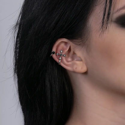 Bound Vestige Ear Cuffs in antiqued silver worn on the upper ear in a close side-profile crop with dark hair.