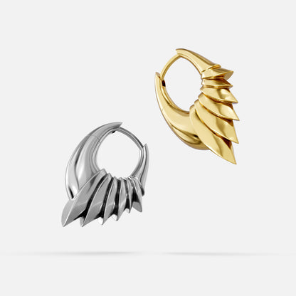 Silver and gold Carapace Wing hoop earrings shown from front and side