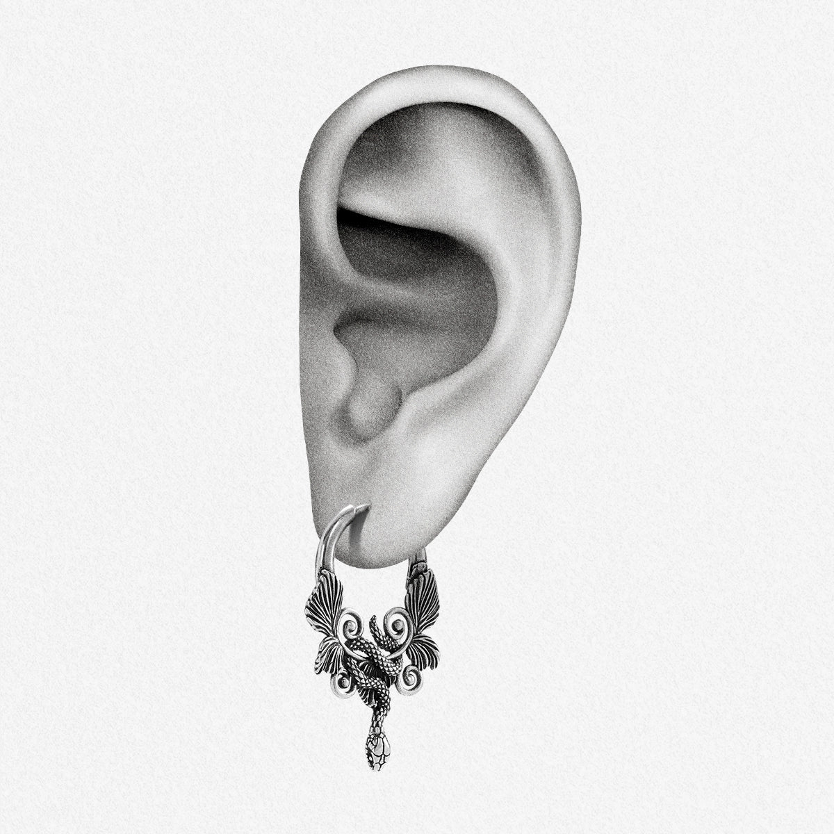 Silver Celestial Serpent hoop earring shown on an ear illustration