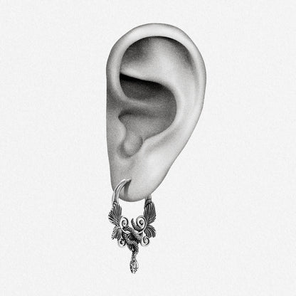 Silver Celestial Serpent hoop earring shown on an ear illustration