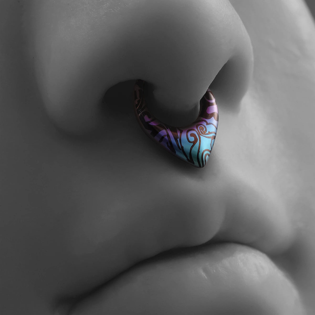 Multicolor Chroma Wave titanium clicker worn as a septum ring