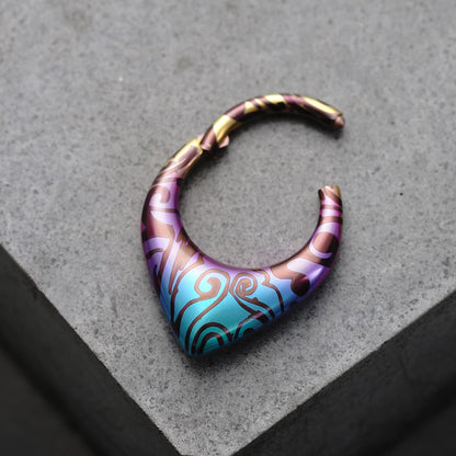 Open Chroma Wave titanium clicker with purple, aqua, and bronze pattern