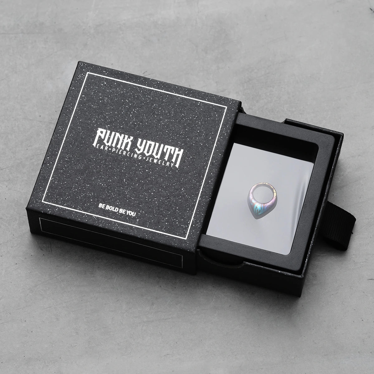 Chroma Wave titanium clicker presented in a black PUNKYOUTH jewelry box