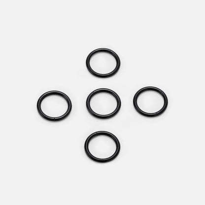 Five black Chromatic Loop rings arranged on a white background