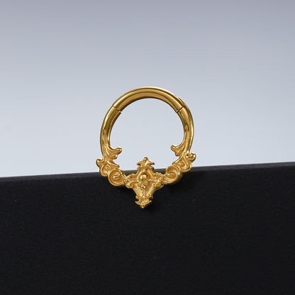 Gold Classical Phantasm clicker displayed against a black pedestal