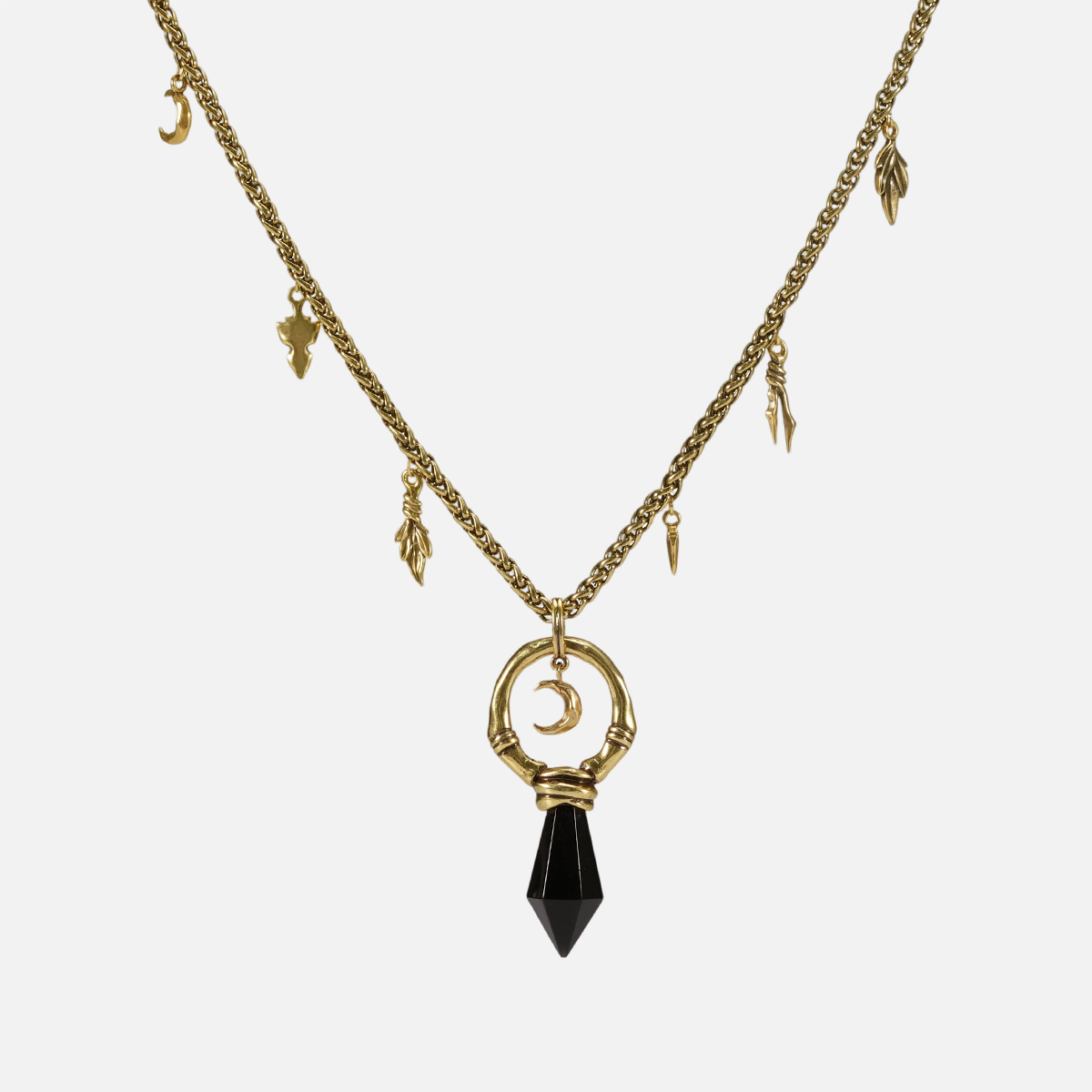 Crescent Ward Necklace in 18K gold plating with black obsidian spike pendant and crescent moon detail