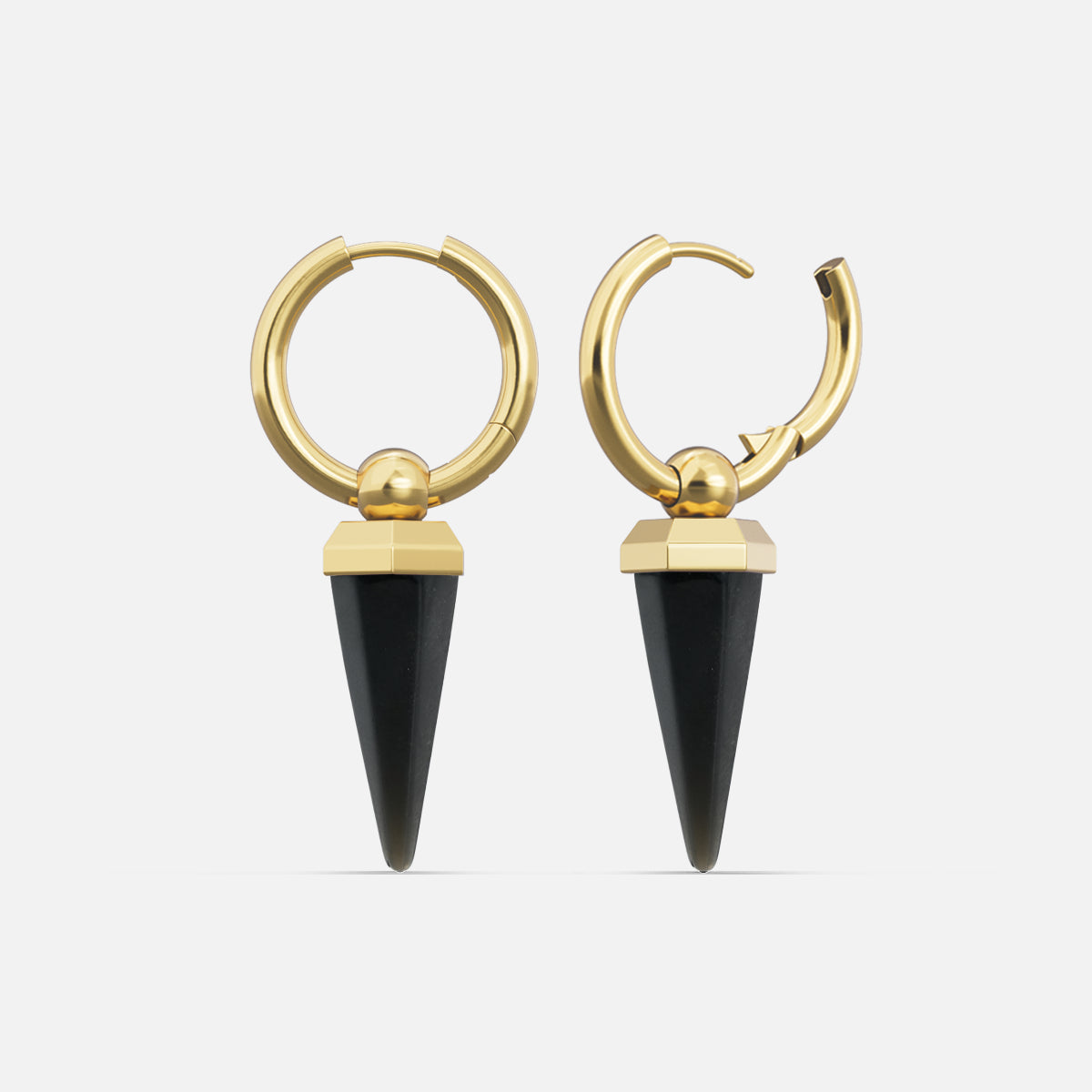 Gold-tone hoop earrings with black spike drops displayed side by side