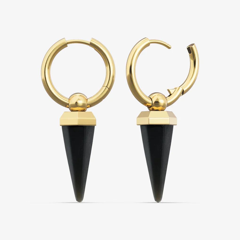 Gold-tone hoop earrings with black spike drops displayed side by side