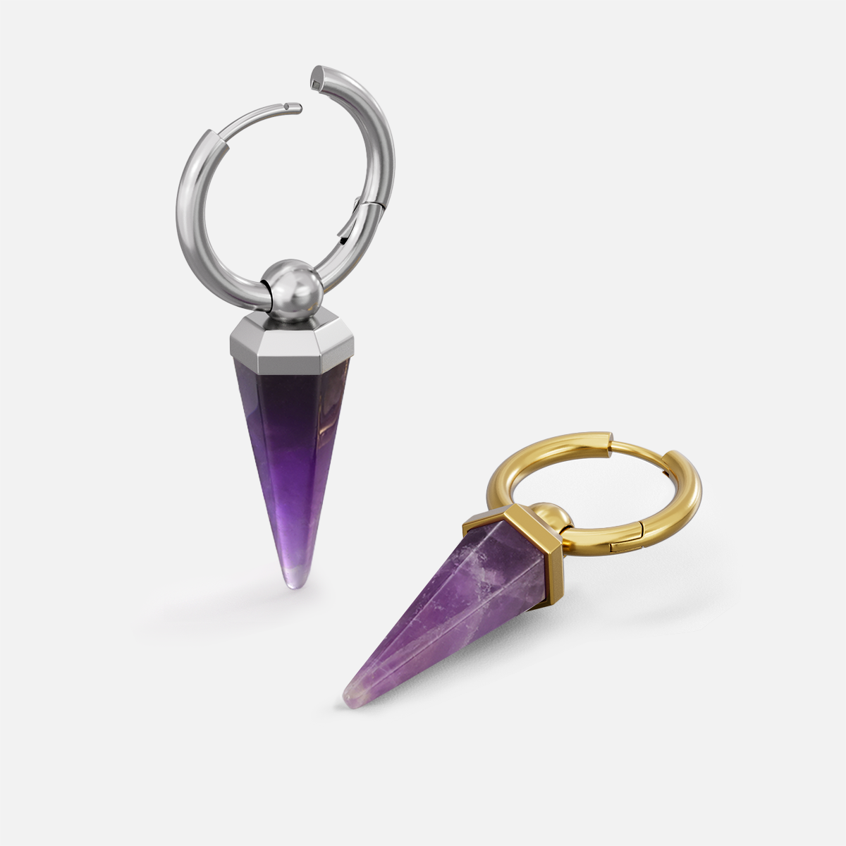 Silver and gold-tone Crystal Prismatic hoop earrings arranged upright and flat with purple crystal points