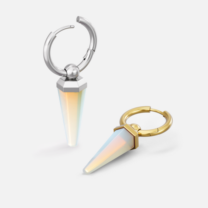 Silver and gold-tone Crystal Prismatic hoop earrings arranged upright and flat with iridescent points