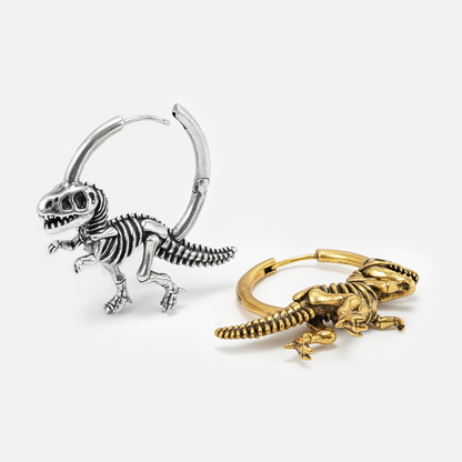 Silver and gold Dinosaur Delight hoop earrings with dangling skeleton motifs