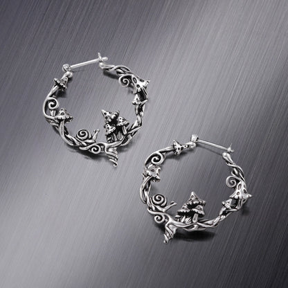 Pair of silver Enchanted Forest Whimsy hoop earrings with woodland fox motifs