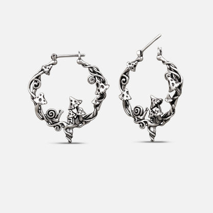 Silver-tone Enchanted Forest Whimsy hoop earrings with mushrooms, leaves, and woodland details