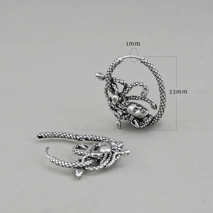 Silver Enchanted Medusa hoop earring shown upright and flat with dimensions