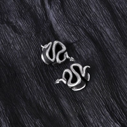 Two silver Enigmatic Serpent tunnels shown from different angles