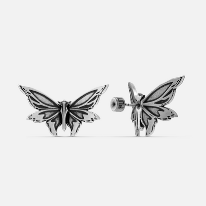 Silver-tone Eternal Moth stud earrings with engraved wings and a sculpted body