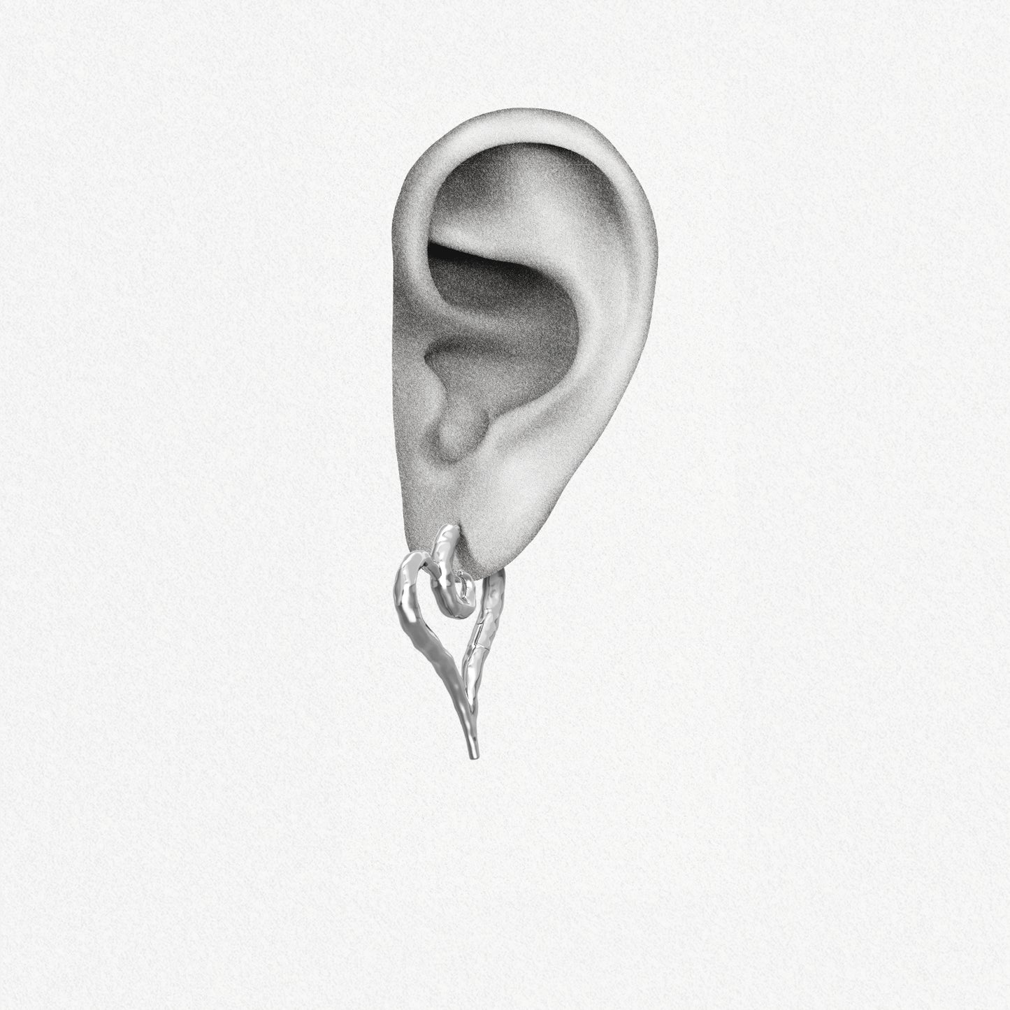 Gold Ethereal Heartflow earring shown on an ear illustration