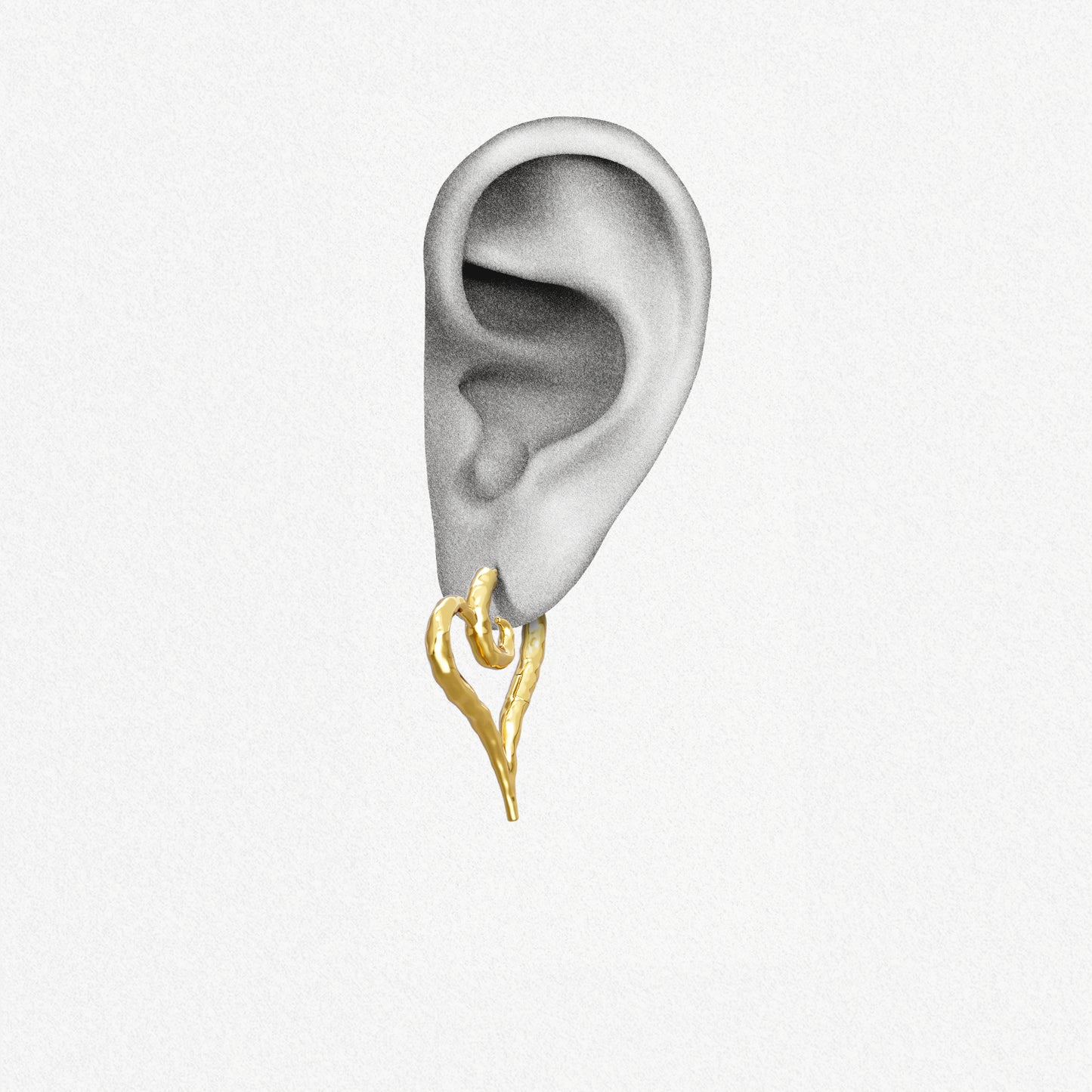 Gold Ethereal Heartflow earring shown on an ear illustration