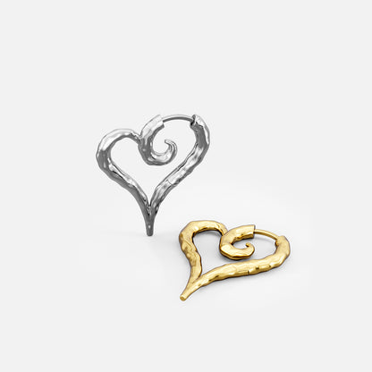 Silver and gold Ethereal Heartflow earrings shown upright and lying flat