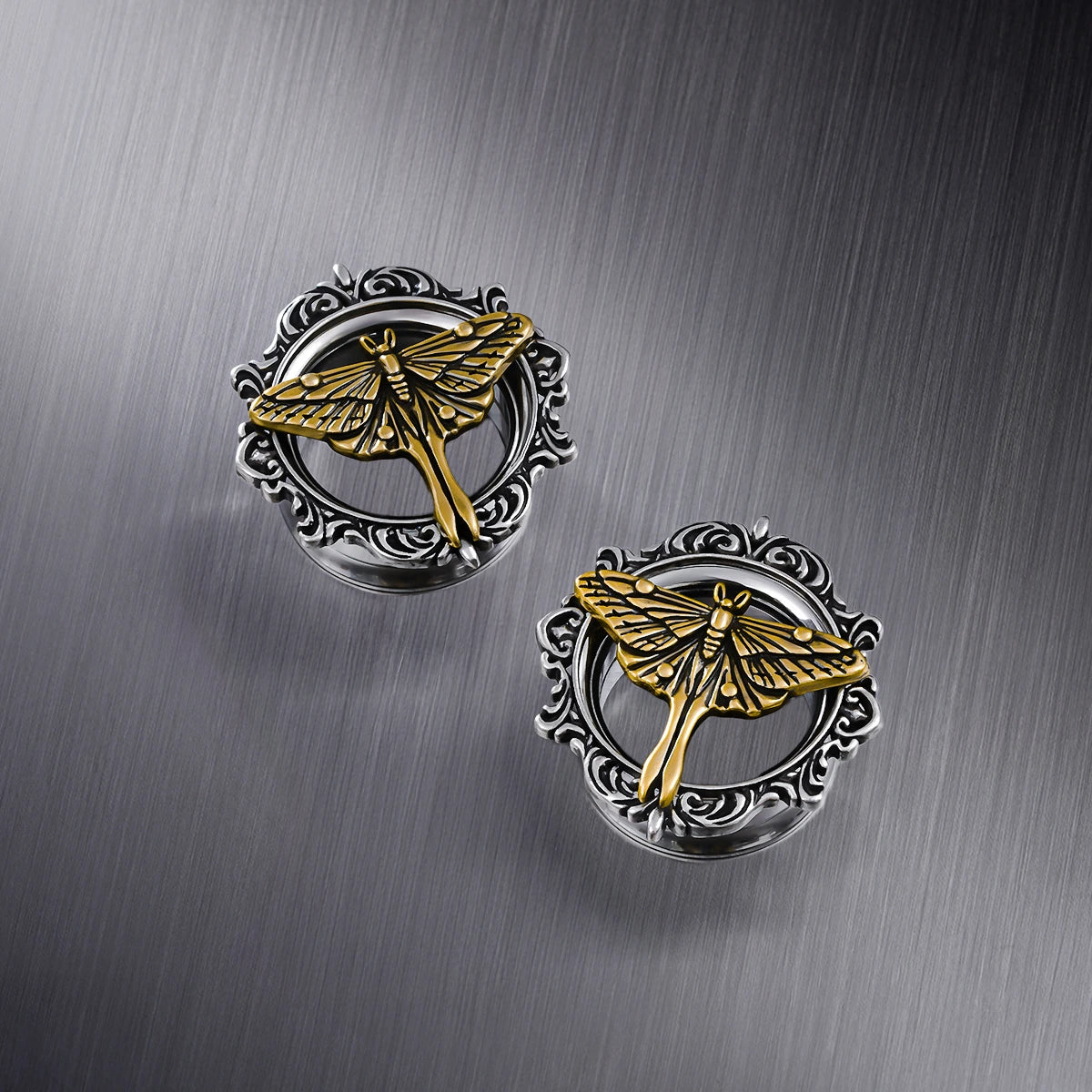 Pair of silver Ethereal Moth tunnels with gold moth centers