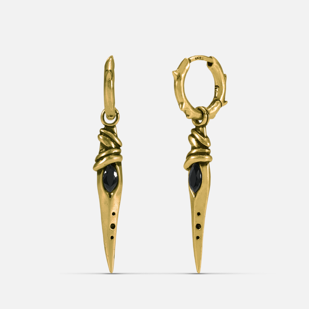 Gold-tone Eye Dagger Earrings feature eye-shaped stone inlays and dagger drop pendants.