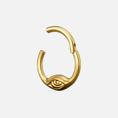 Gold-tone Eyelock Clicker shown open with a hinged closure and sculpted eye motif.