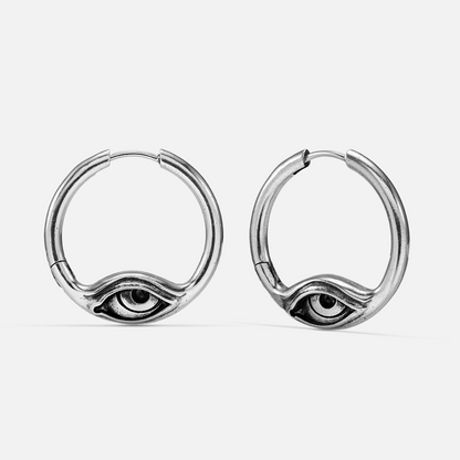 Silver-tone Eyelock hoop earrings with a sculpted eye centerpiece