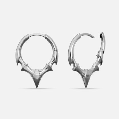 Silver-tone Fang Crest hoop earrings with a pointed lower crest and curved side spikes