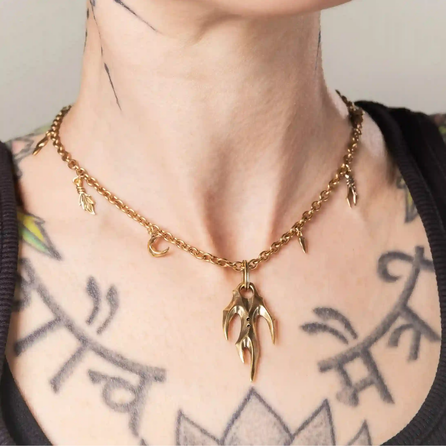 Gold Feral Husk Necklace styled as a wild relic inspired statement piece