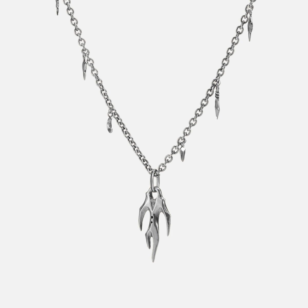 Silver Feral Husk Necklace with sculptural claw pendant and curb chain