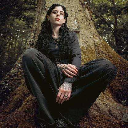Feral Husk Necklace styled on model in a woodland portrait with wild relic inspired design