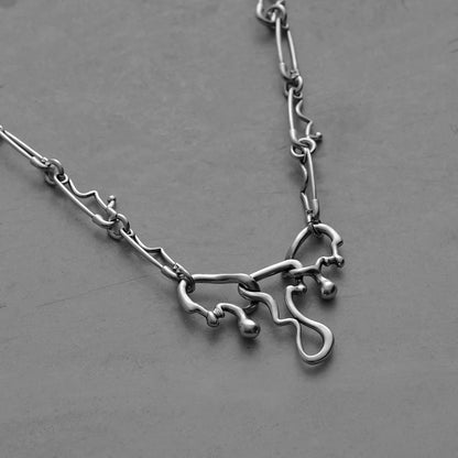 Silver Fluid Pin necklace with irregular liquid-shaped links