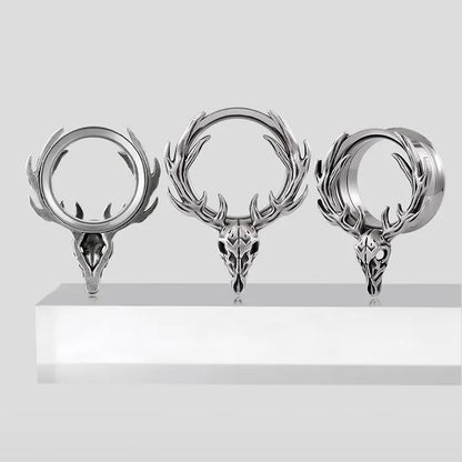Three sizes of silver Forest Guardian tunnels displayed on a white pedestal