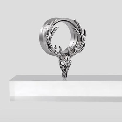 Single silver Forest Guardian tunnel displayed upright on a white pedestal
