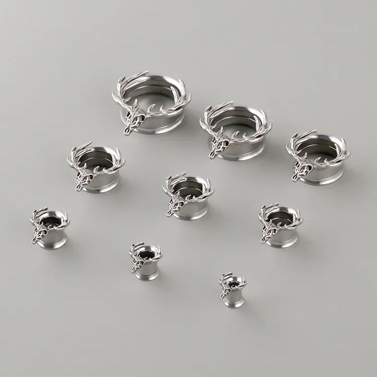 Silver Forest Guardian tunnels in graduated sizes arranged on a light surface