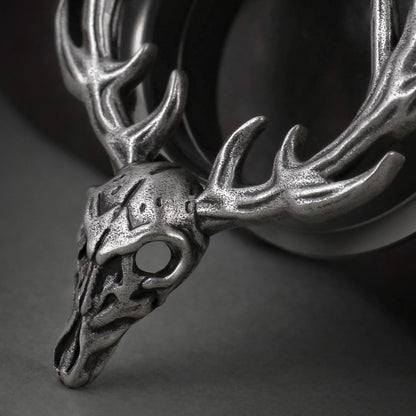 Close-up of silver Forest Guardian tunnel with antlered skull detail