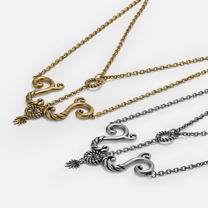 Gold and silver options for the sculptural tideworn knot necklace with sea inspired details