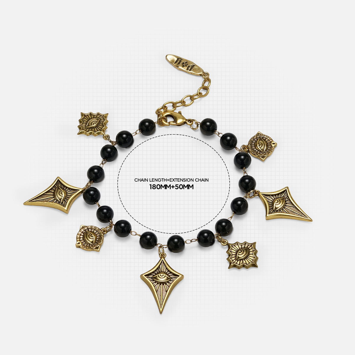 Gold Watcher’s Constellation Bracelet featuring evenly spaced charms around the wrist