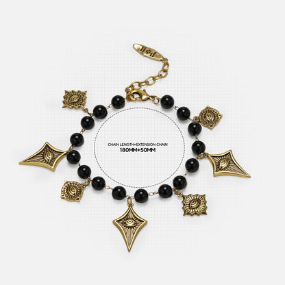 Gold Watcher’s Constellation Bracelet featuring evenly spaced charms around the wrist