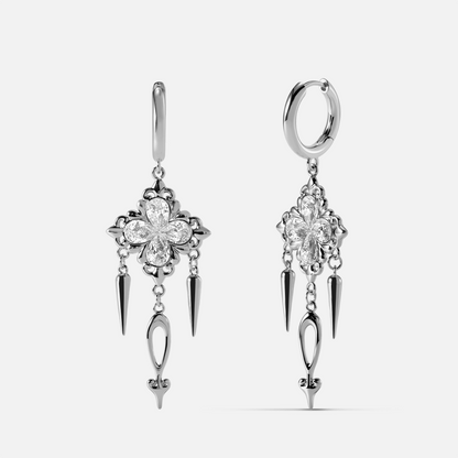 Silver-tone Gothic Bloom dangle earrings with ornate floral medallions and slim spike charms