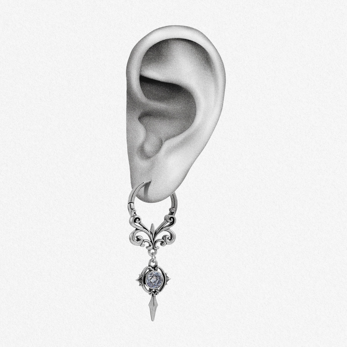 Silver-tone Gothic Crest hoop earring positioned on an illustrated earlobe to show the ornate drop length