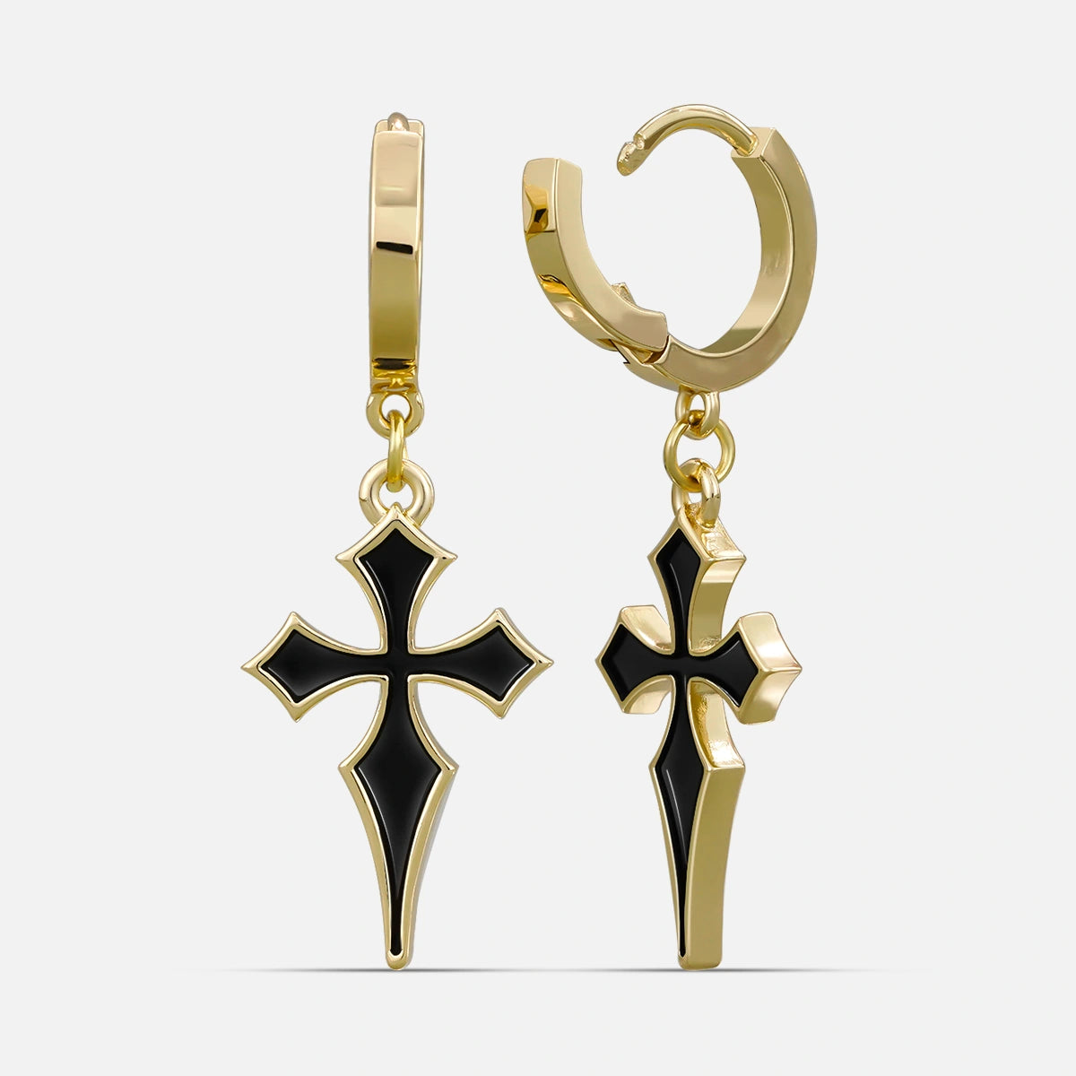 Pair of gold-tone hoop earrings with black cross charms shown from front and side angles