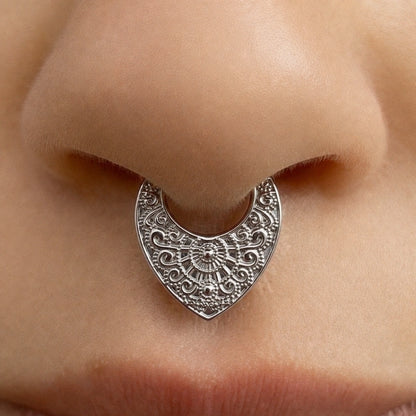 Silver-tone Gothic Mandala Clicker worn as a septum ring, featuring an ornate shield-shaped design.