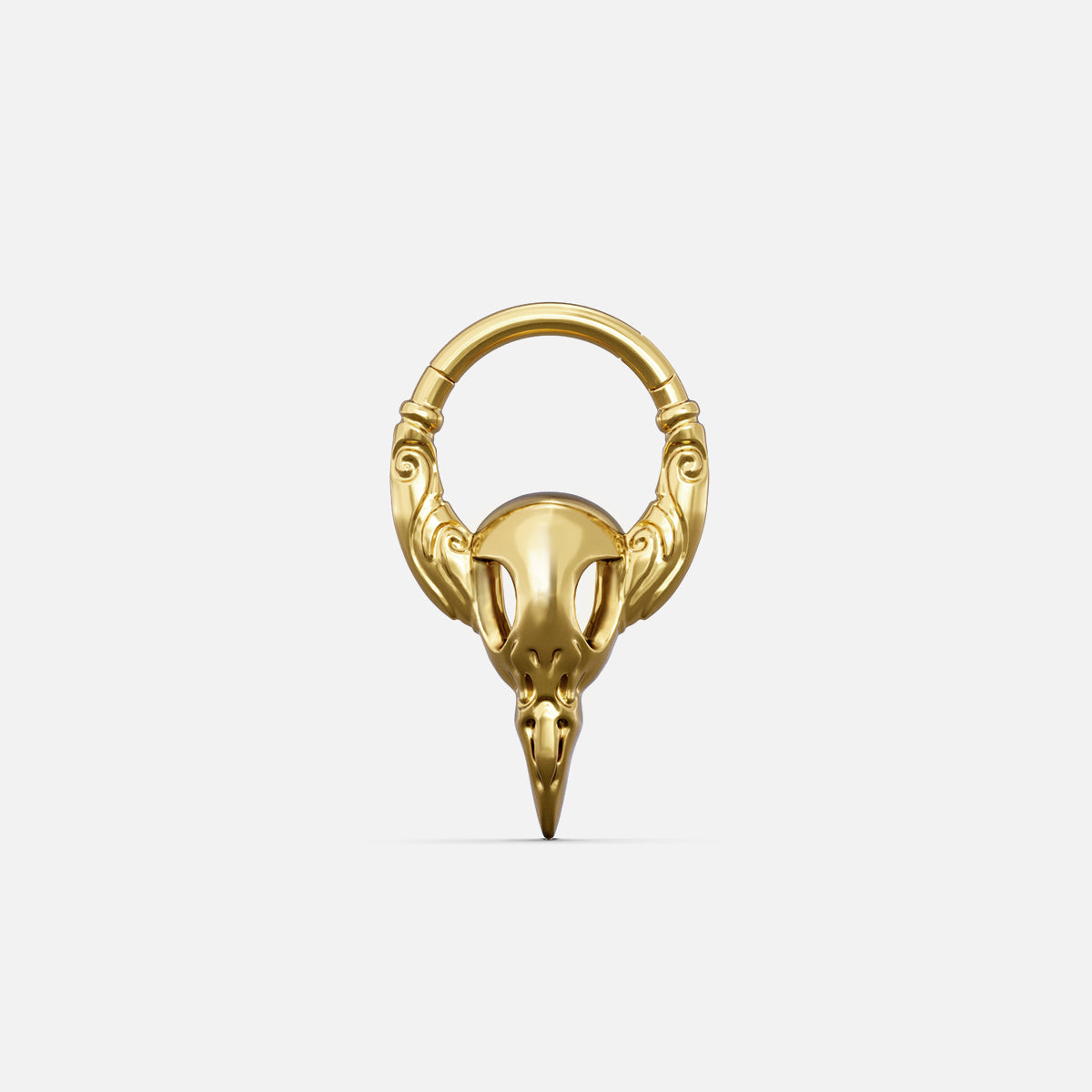 Gold-tone Gothic Raven Clicker with a sculpted raven skull, pointed beak, and decorative ring details.
