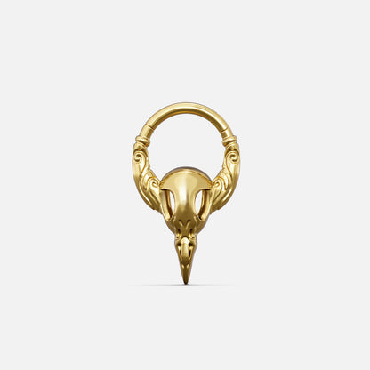 Gold-tone Gothic Raven Clicker with a sculpted raven skull, pointed beak, and decorative ring details.