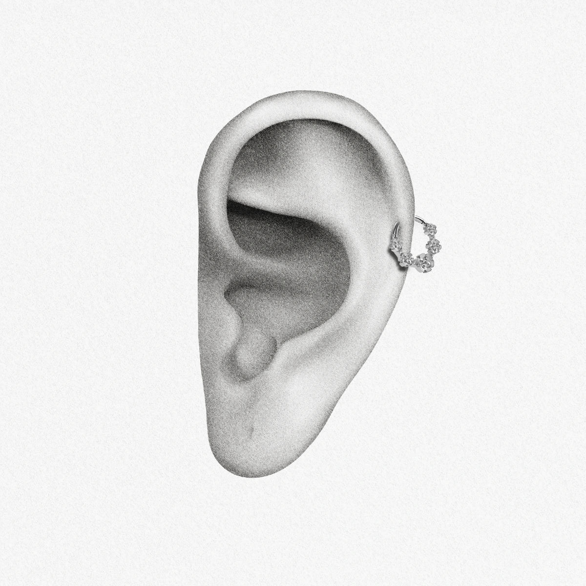 Silver Gothic Rosette Clicker shown on ear placement with gothic floral rosette details