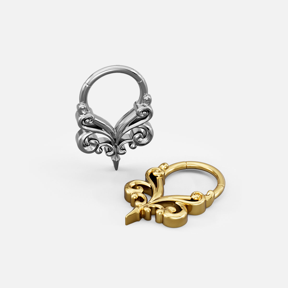 Silver- and gold-tone Gothic Vine Clickers shown together from front and side angles.