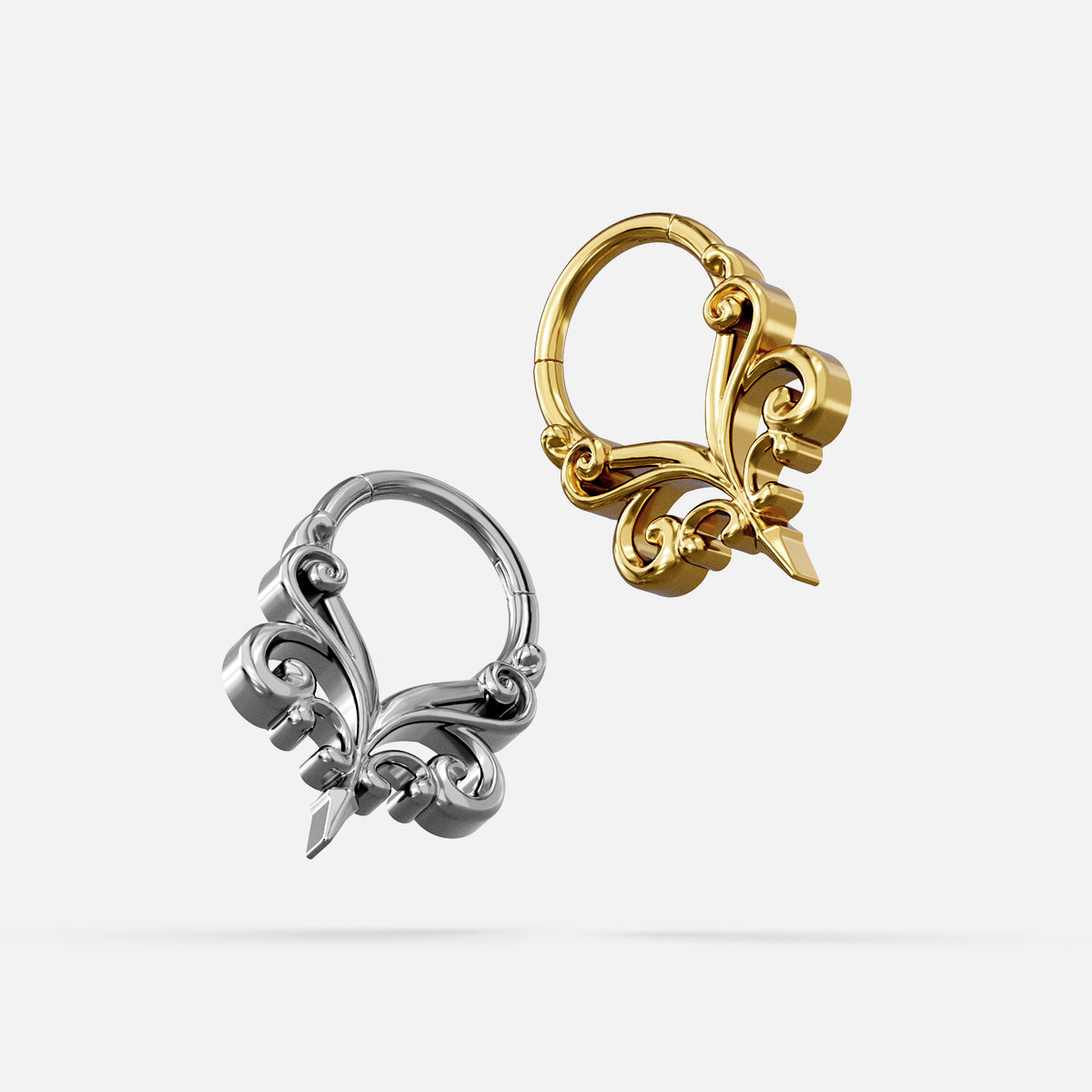 Silver- and gold-tone Gothic Vine Clickers displayed side by side to compare the two finishes.